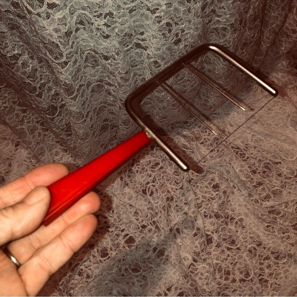 Retro Red Handled Bakelite cheese cutter from the early 40s, a great collectible